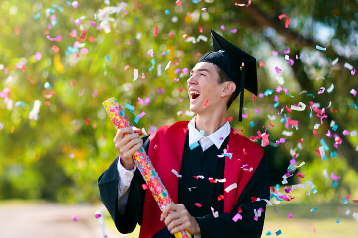 Private school graduate celebrating