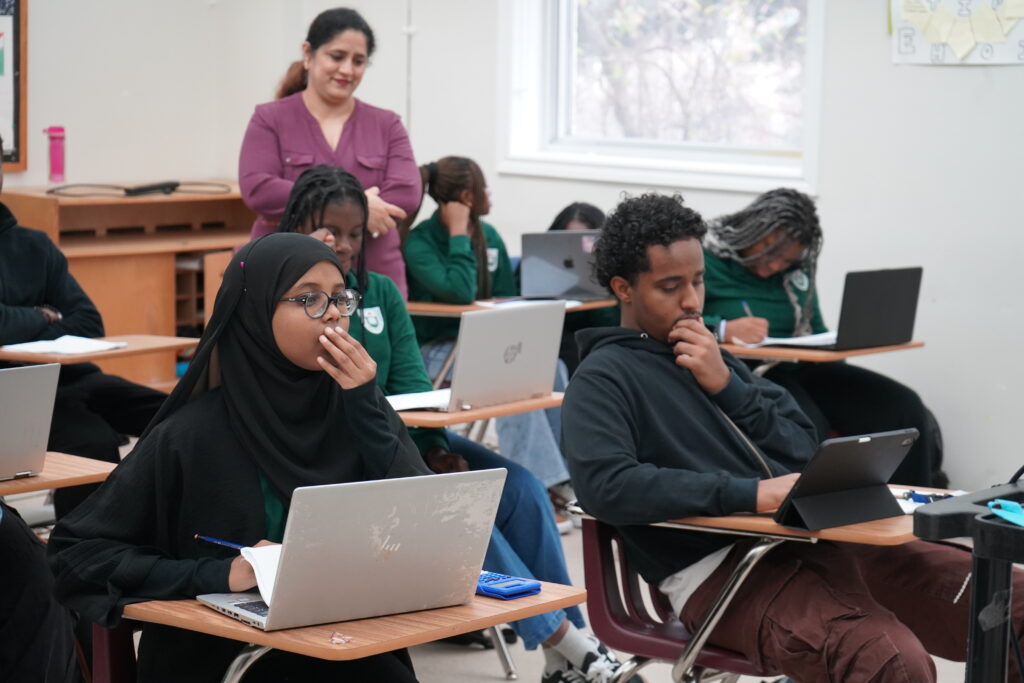 International students discussing in a Canadian classroom