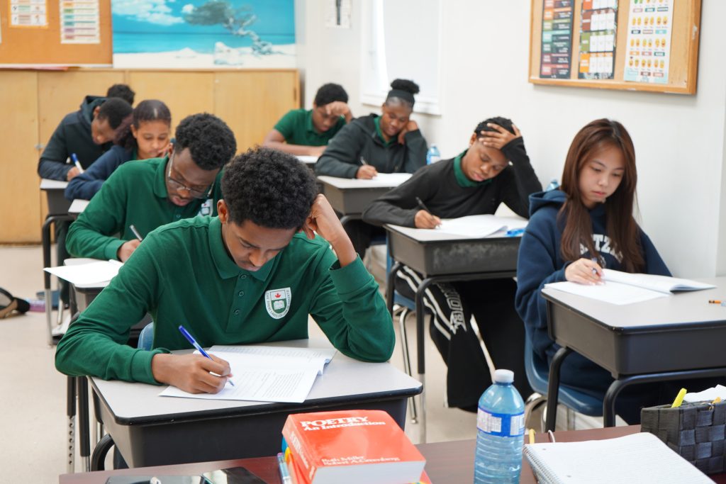 GLCT students using technology in a Toronto private high school classroom.