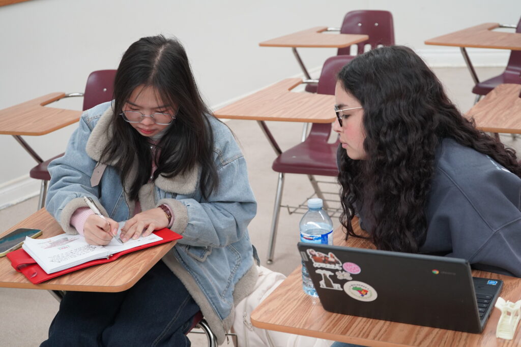 International student learning in a modern Canadian classroom focused on future-ready education.